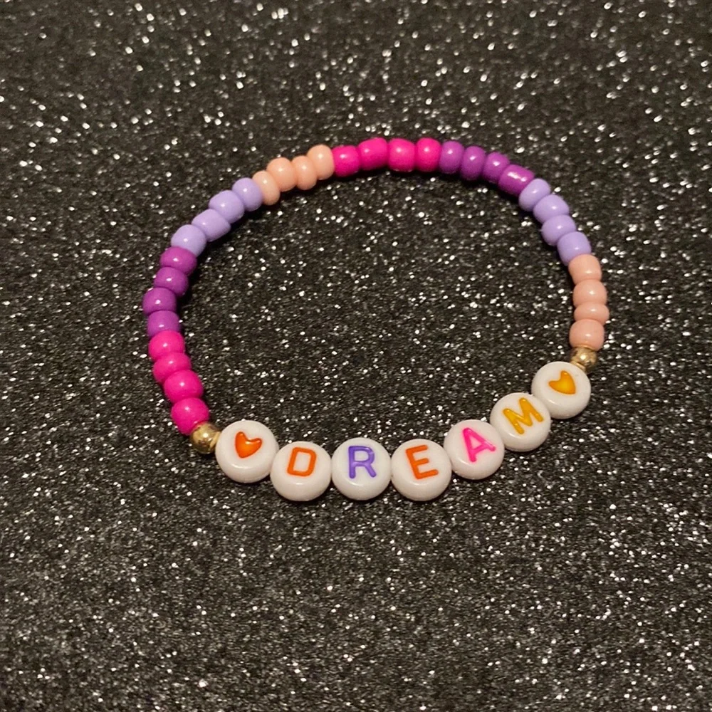 Kids multi purple bead friendship stretch bracelet